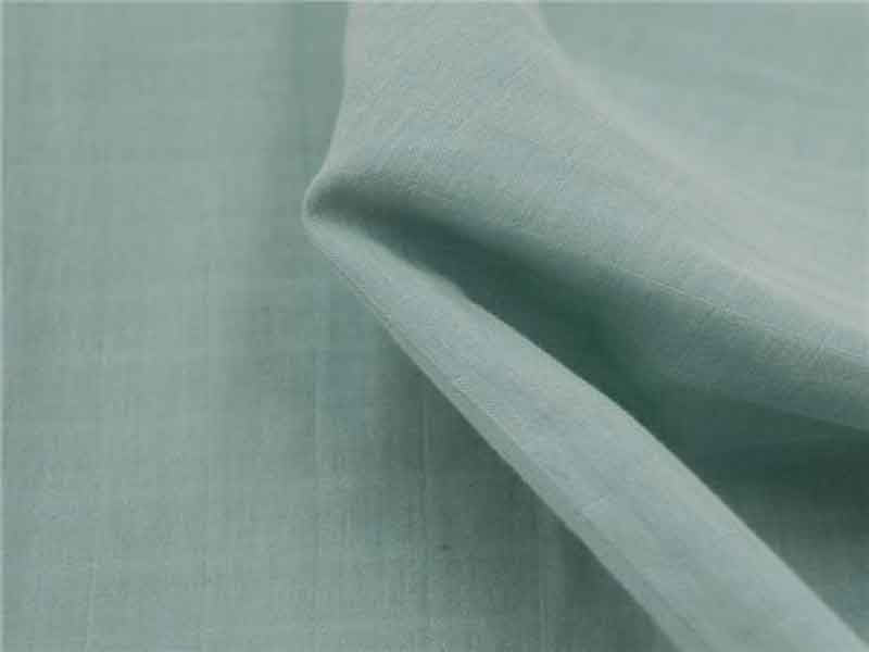 Tissu Lange en coton bio à carreaux faux uni menthe x10cm dans TISSUS BIOLOGIQUES par Couture et Cie