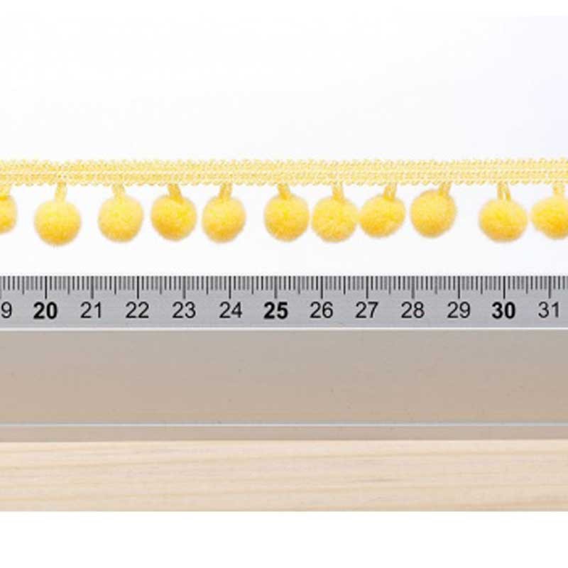 Galon pompon jaune 18mm dans Galons pompons par Couture et Cie