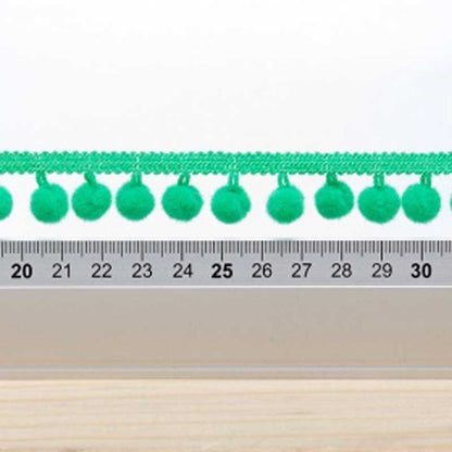 Galon pompon vert 18mm dans Galons pompons par Couture et Cie