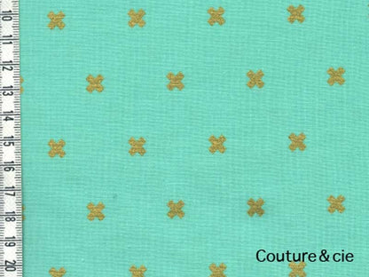 Tissu Xoxo vert effet doré dans COTTON + STEEL par Couture et Cie