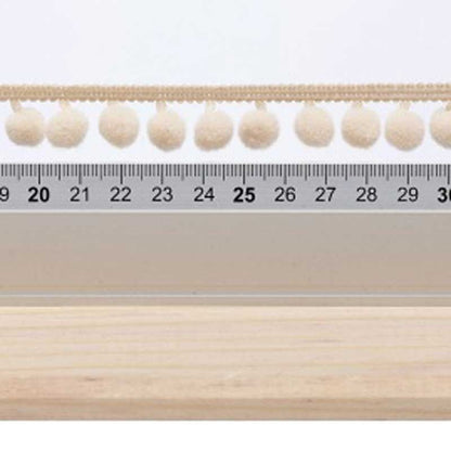 Galon pompons beige 18mm dans Galons pompons par Couture et Cie