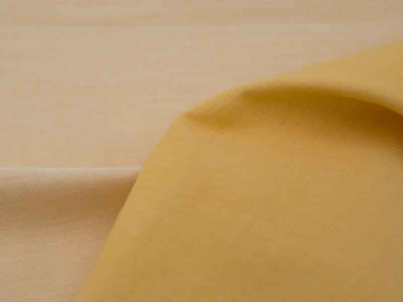 Tissu Chambray en coton bio jaune safran, coupon 40x150cm dans TISSUS BIOLOGIQUES par Couture et Cie