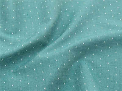 Tissu Chambray bio à pois lagune dans TISSUS BIOLOGIQUES par Couture et Cie