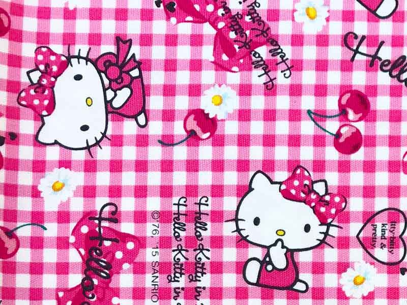 Tissu Hello Kitty cherry rose, x10cm dans Tissus Enfantins par Couture et Cie
