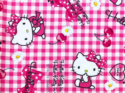 Tissu Hello Kitty cherry rose, x10cm dans Tissus Enfantins par Couture et Cie