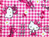 Tissu Hello Kitty cherry rose, x10cm dans Tissus Enfantins par Couture et Cie