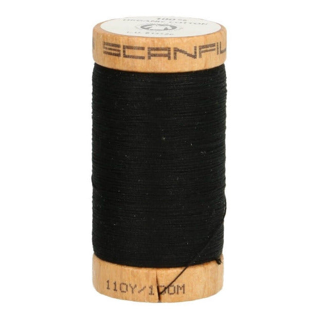 Bobine de fil noir en coton biologique
